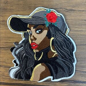 Embroidered Patch with Red and Black Design